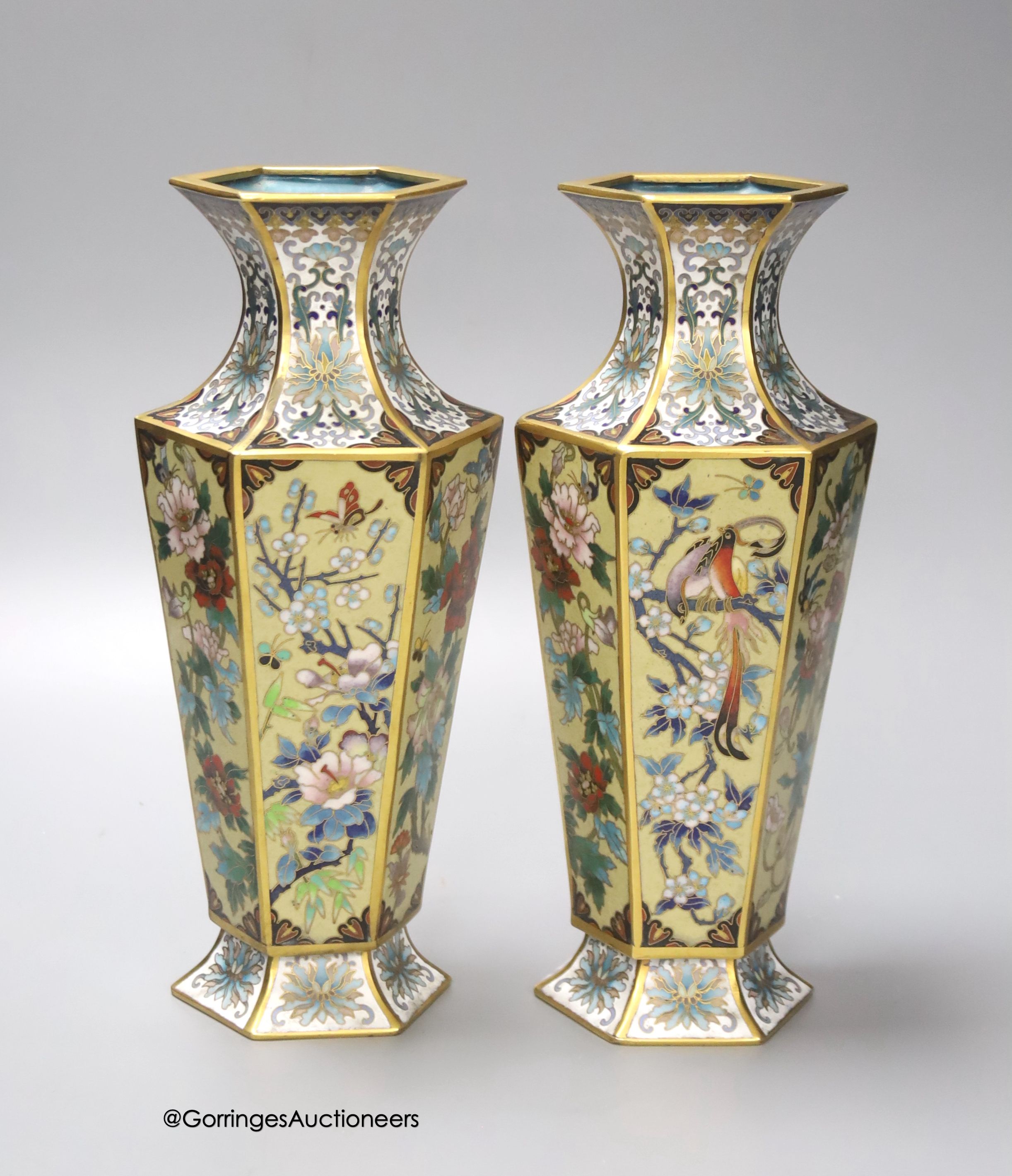 A pair of Chinese cloisonne enamelled hexagonal vases, 26cm